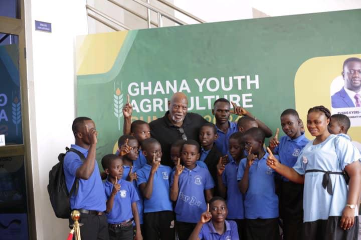 Dr. Brown with Juma Academy children at Ghana Youth Agriculture Summit